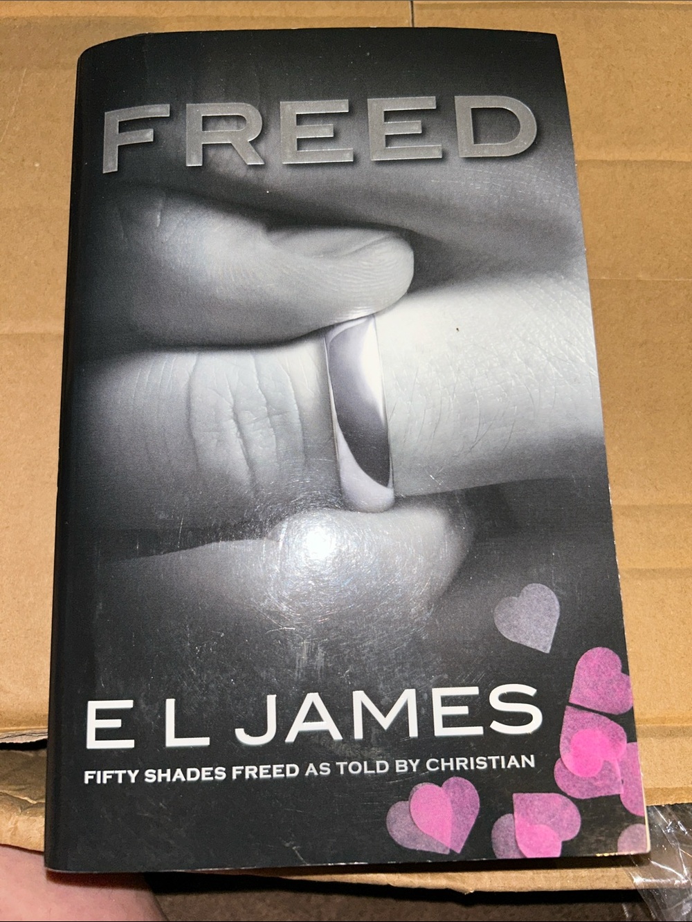 Fifty Shades Freed by E L James - Black Cover with Pink Hearts